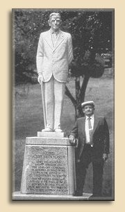 Elmer T. Lee at the foot of Col. Blanton's statue
