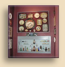 Display case with fiddle bottles